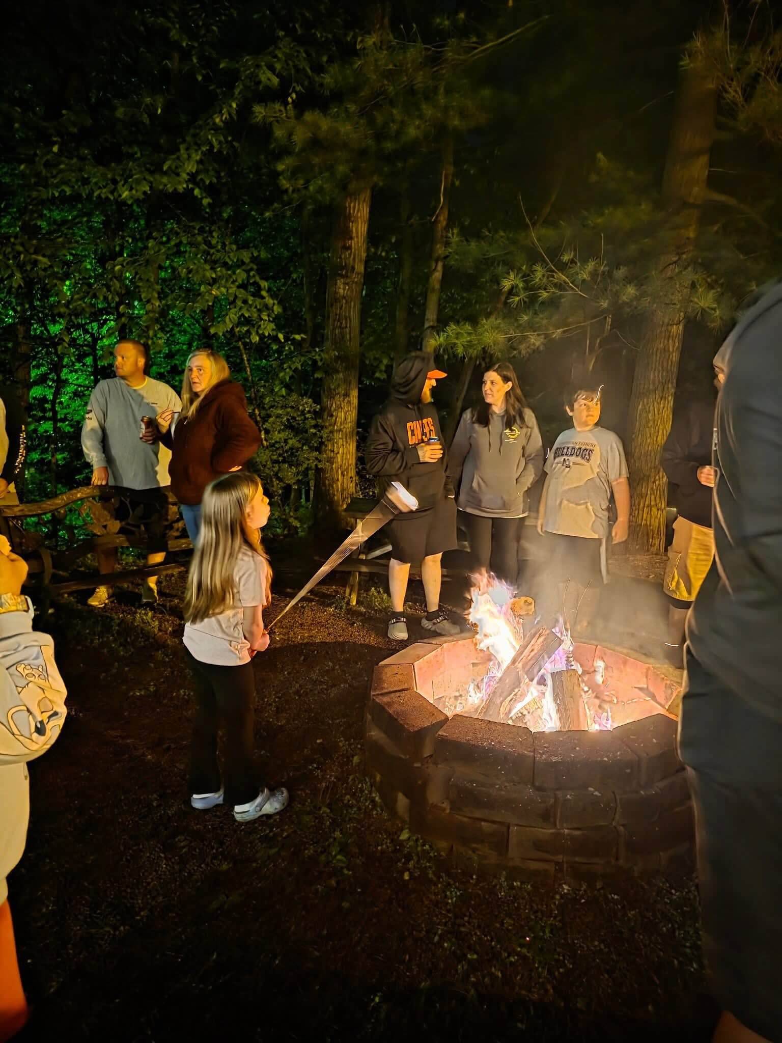 Campfire gathering at a Rosemount campsite